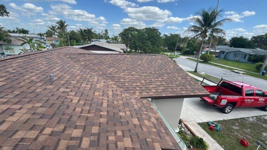 new shingle roof fort myers florida with royalty truck in drive way