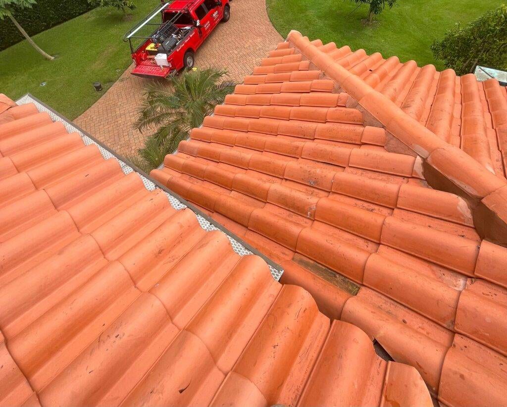 tile roof drying after replacement with royalty roofing truck in the driveway