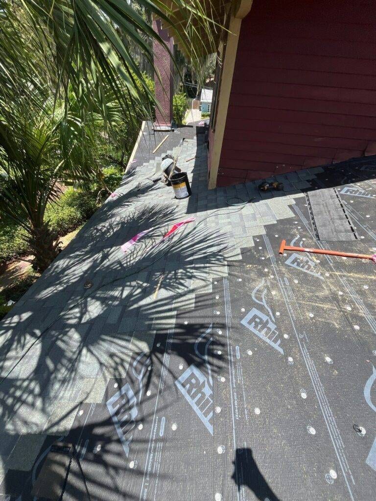 shingle roof being replaced in orlando with tiles started and underlay showing