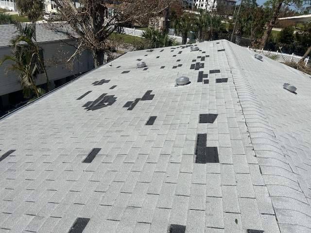 shingle roof damaged by storm fort myers