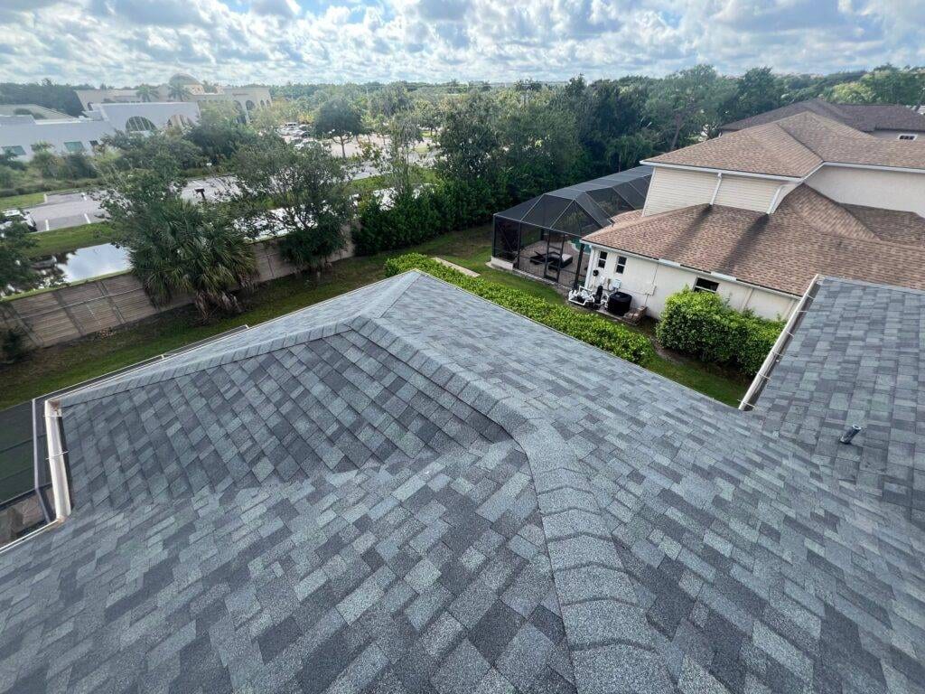 picture from shingle tile roof after completed roofing job overlooking suburb in florida