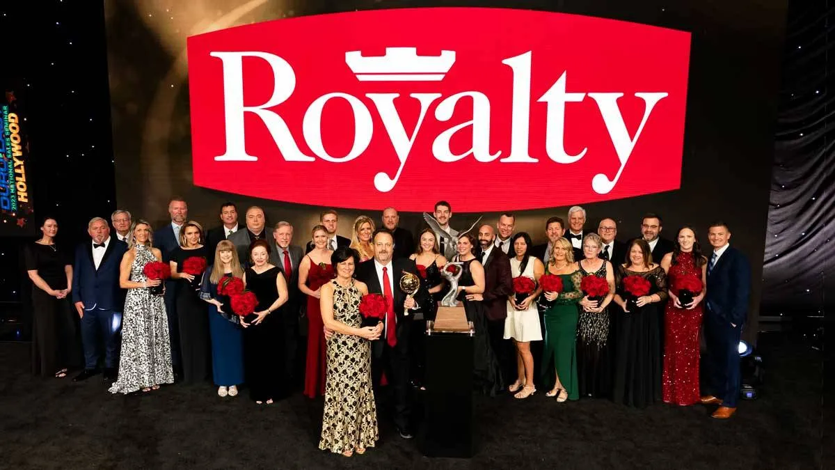 Royalty team holding award at the Durolast Convention