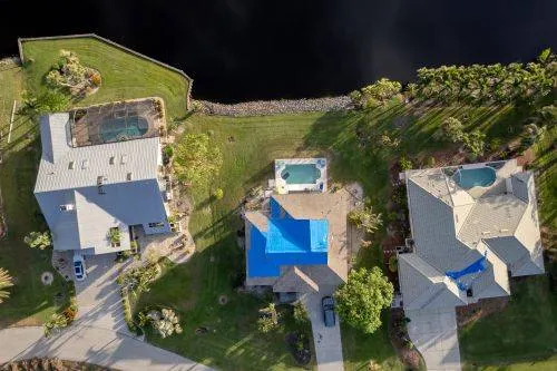 tarped roofs after storm