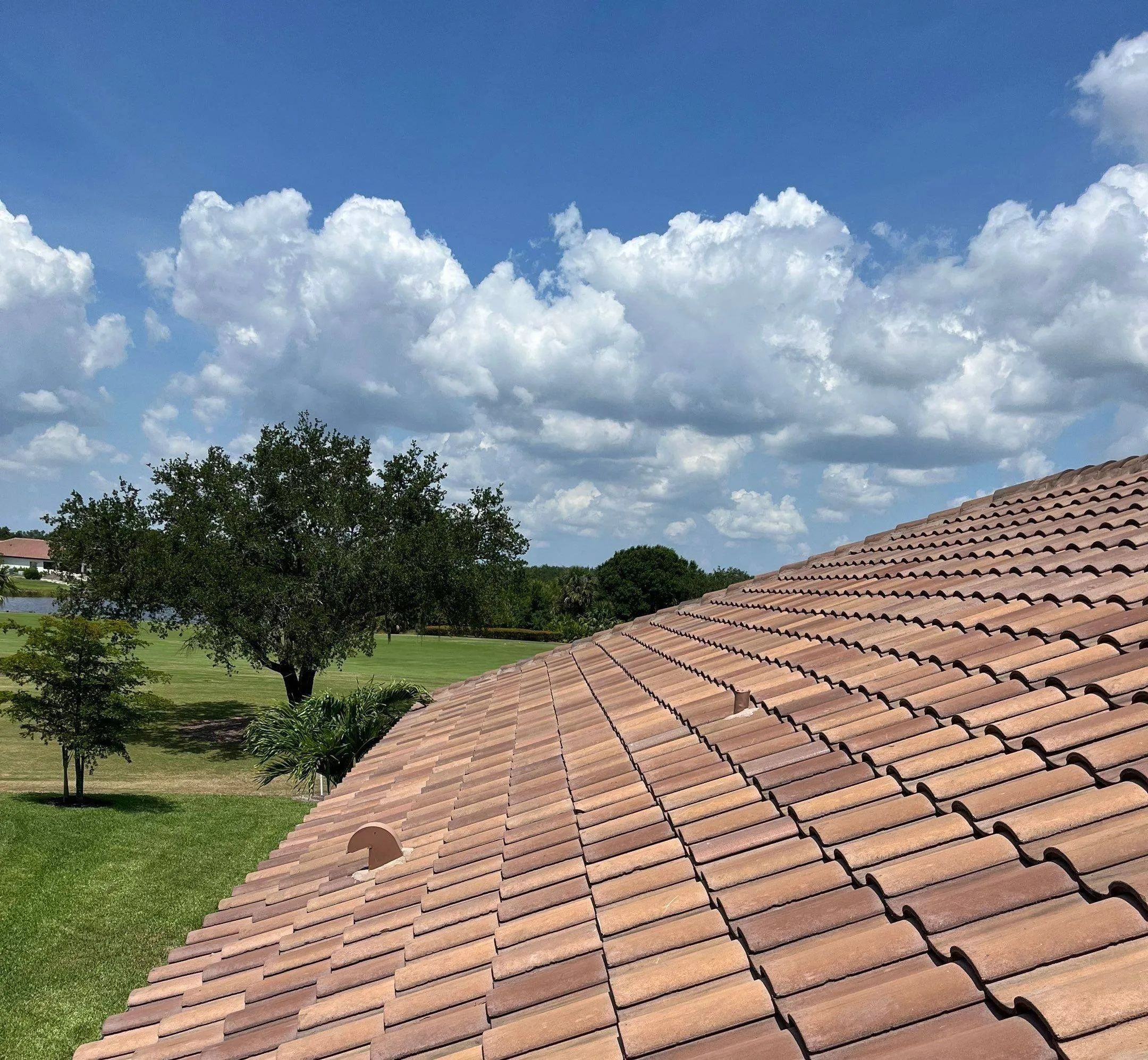 new brown clay tile roof just installed on home in florida suburb